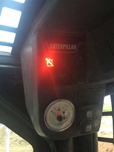 cat skid steer troubleshooting light